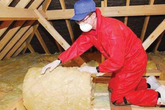 EnergyCare installer fitting loft insulation